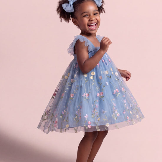 Aurora Dress in dusty blue floral tulle, three quarter