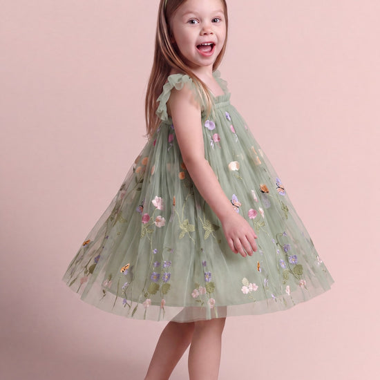 Aurora Dress in sage green floral tulle, three quarter