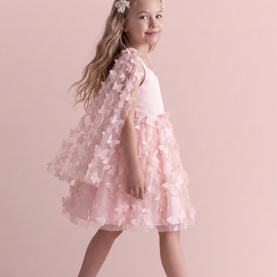 Blossom pink butterfly party dress, side view with the tulle skirt in motion