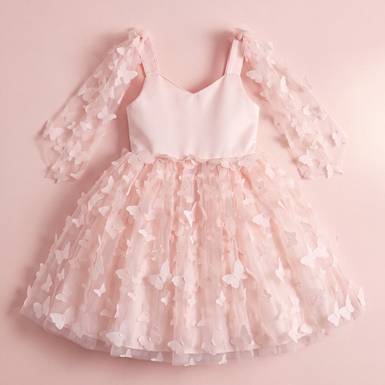 Blossom pink butterfly party dress laid flat, showing the satin bodice, wing panels and butterfly tulle skirt