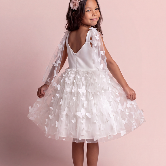 Blossom white butterfly party dress, back view showing the low V back, satin straps and concealed zip