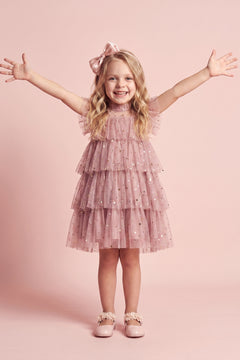 Girl wearing the Celeste Dusty Pink Flower Girl Dress, front