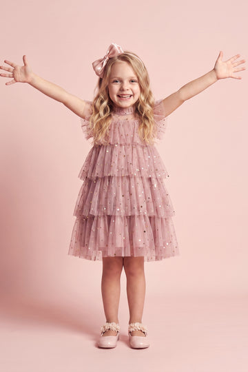 Girl wearing the Celeste Dusty Pink Flower Girl Dress, front