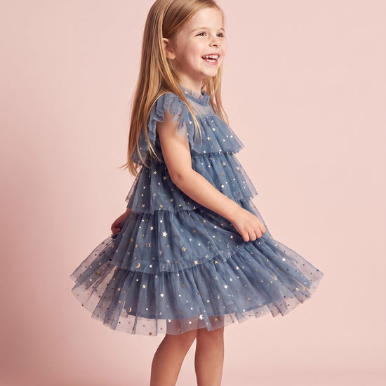 Celeste Dress in dusty blue, three quarter twirl
