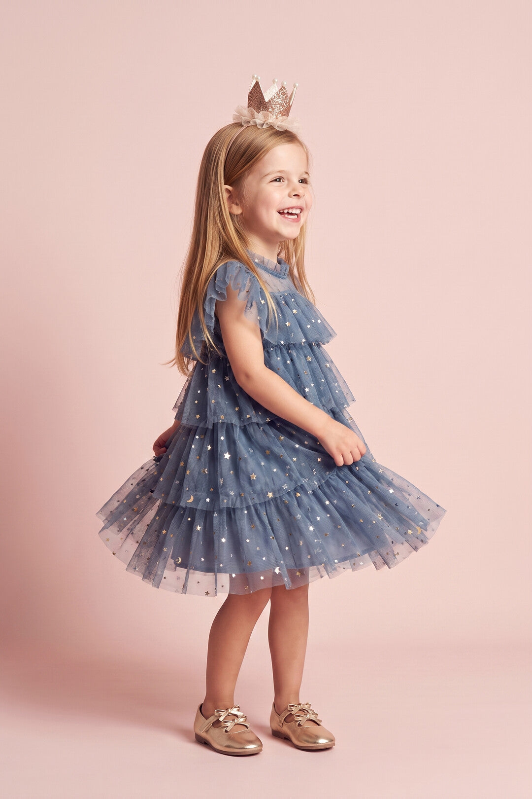 Celeste Dress in dusty blue, three quarter twirl