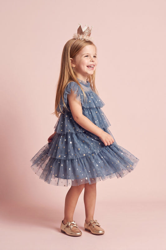 Celeste Dress in dusty blue, three quarter twirl