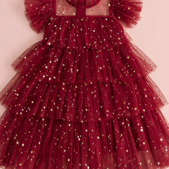 Celeste Wine Red Flower Girl Dress laid flat, showing the collar, sleeves and four tiers of star tulle