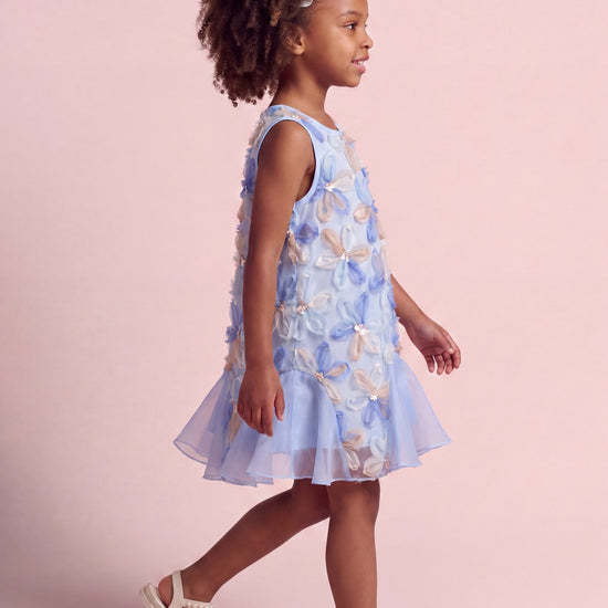 Cornflower Dress in pale blue applique flower mesh, side with ruffled hem