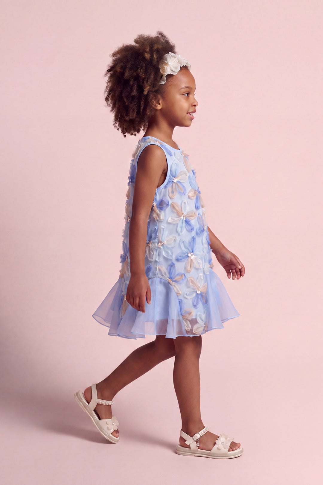 Cornflower Dress in pale blue applique flower mesh, side with ruffled hem