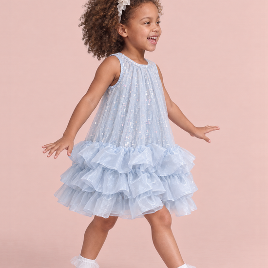 Glacier Ice Blue Sequin Ruffle Party Dress, three quarter view, taking a big step into the light