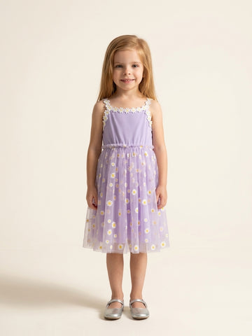 Girl in daisy tulle sling dress
