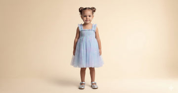 Girl in rainbow sequin tutu dress