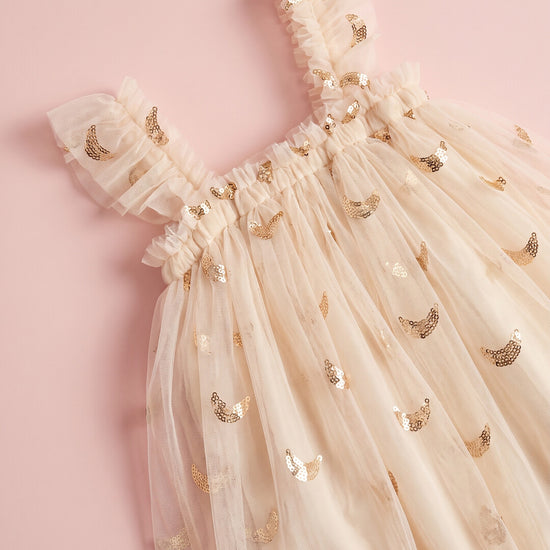 Midnight Star Dress cream fabric detail, gold star and moon sequins