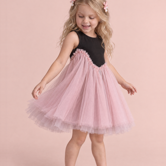 Odette Black and Pink Tutu Party Dress, three quarter view, looking down at the tutu as it swings