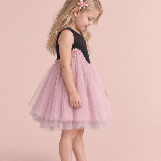 Odette Black and Pink Tutu Party Dress, side view, looking down at her ballet flats