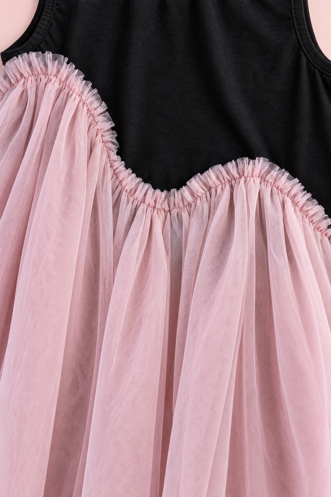 Odette Black and Pink Tutu Party Dress, close up of the wave seam and frill where the black jersey meets the pink tulle