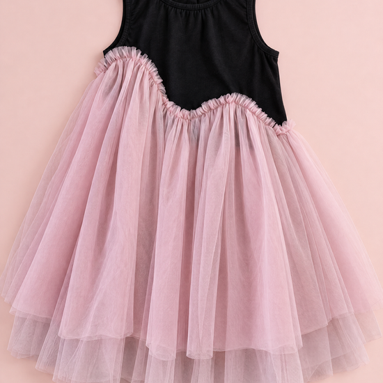 Odette Black and Pink Tutu Party Dress laid flat, showing the black top, the wave seam and the full tulle skirt
