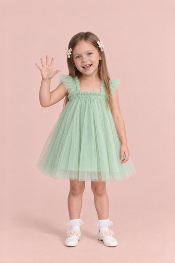 Girl wearing the Papillon Mint Butterfly Back Flower Girl Dress, front, holding up five fingers