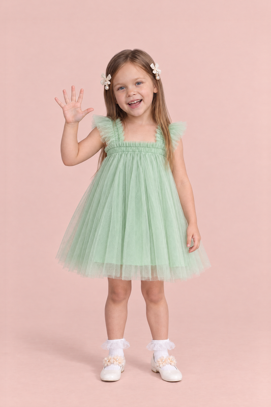 Girl wearing the Papillon Mint Butterfly Back Flower Girl Dress, front, holding up five fingers