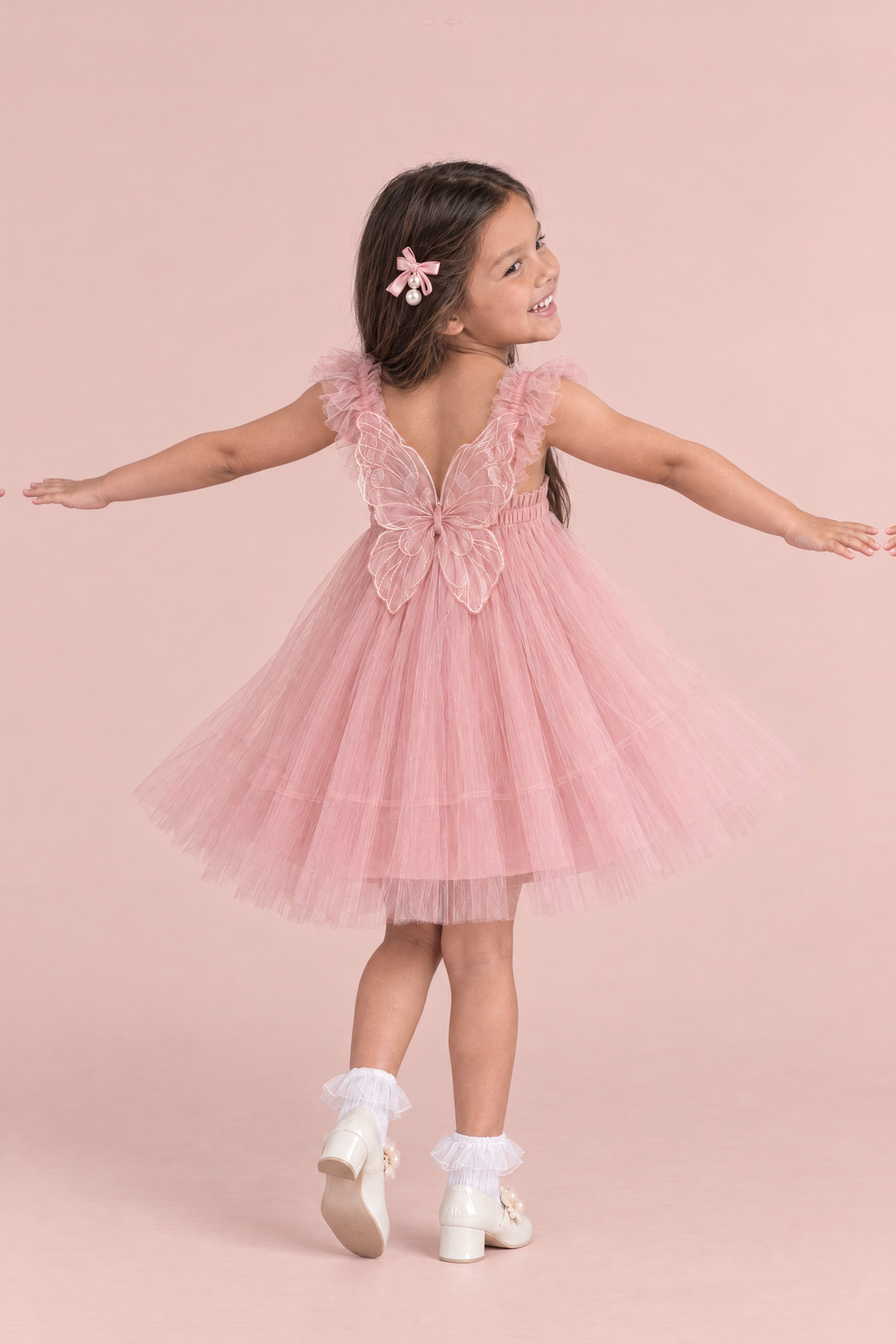 Papillon Dusty Rose Butterfly Back Flower Girl Dress, back, arms out like wings, one large organza butterfly between the straps
