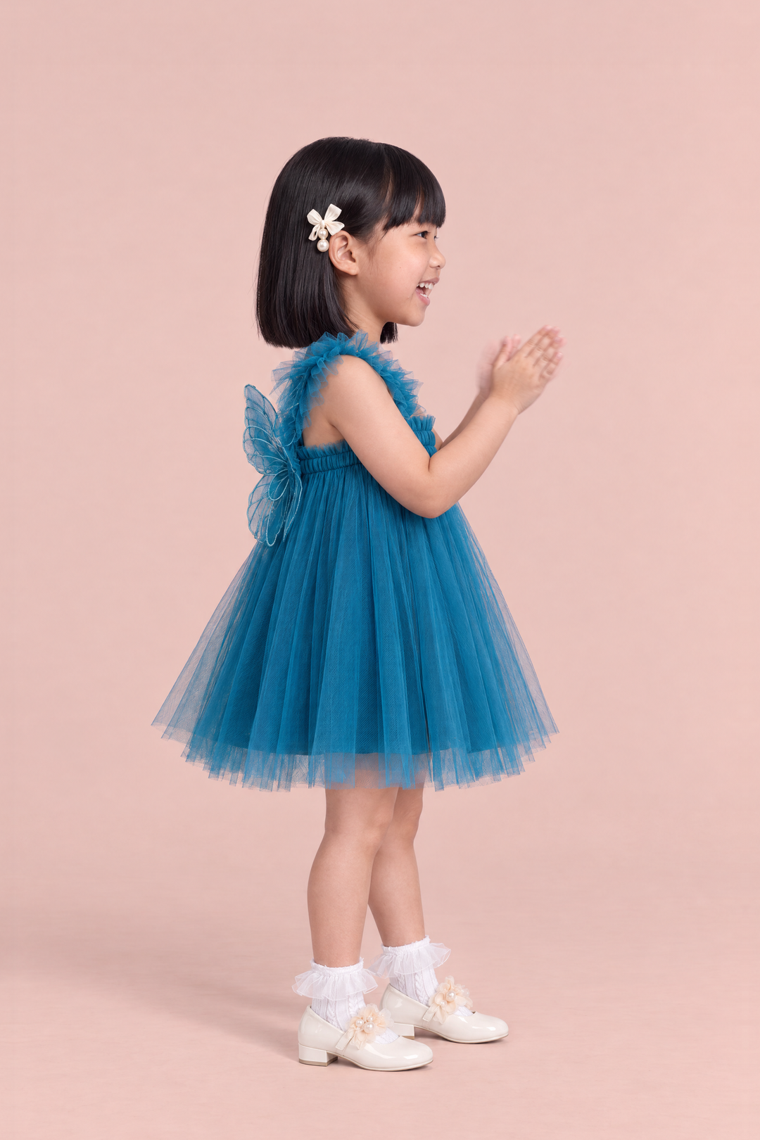 Papillon Teal Butterfly Back Flower Girl Dress, side, clapping with delight