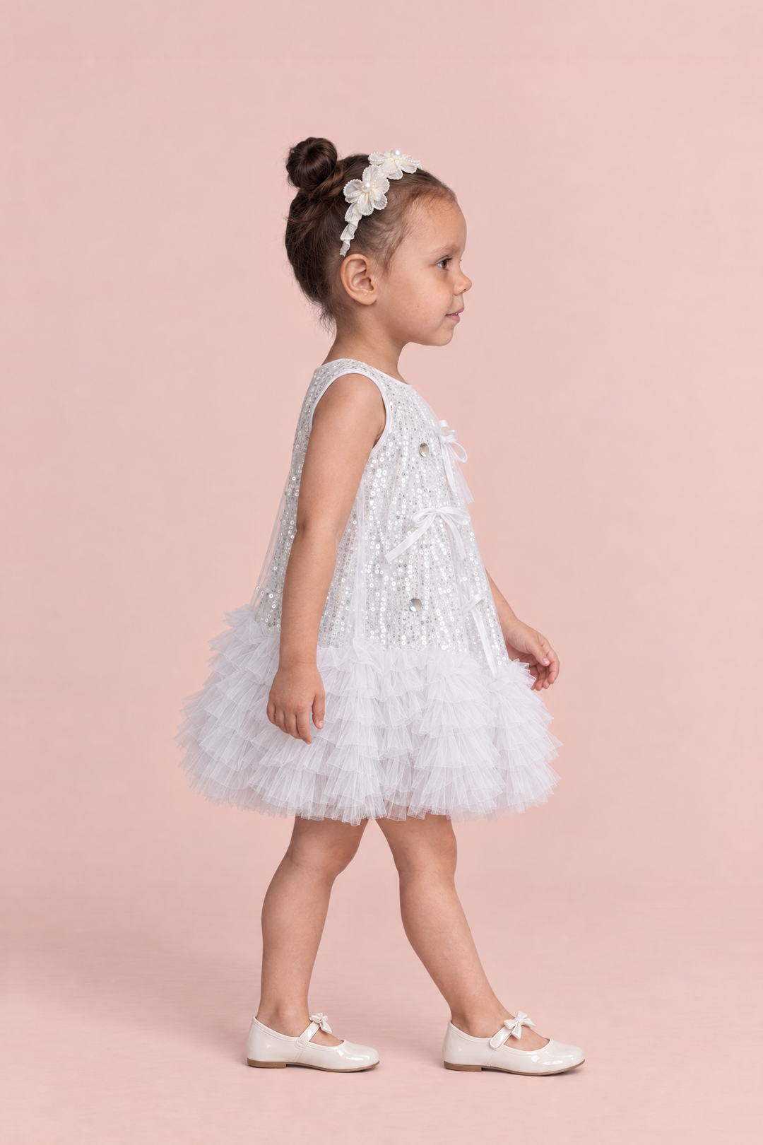Periwinkle Silver Sequin Party Dress, side view showing the A line swing shape and the tulle ruffle hem