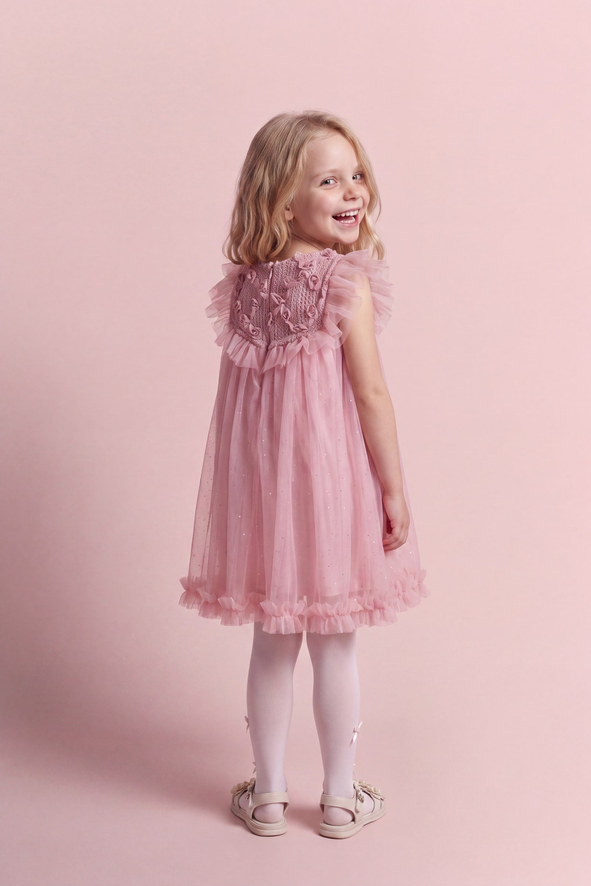 Back view of the Primrose pink flower girl dress with its concealed centre back zip