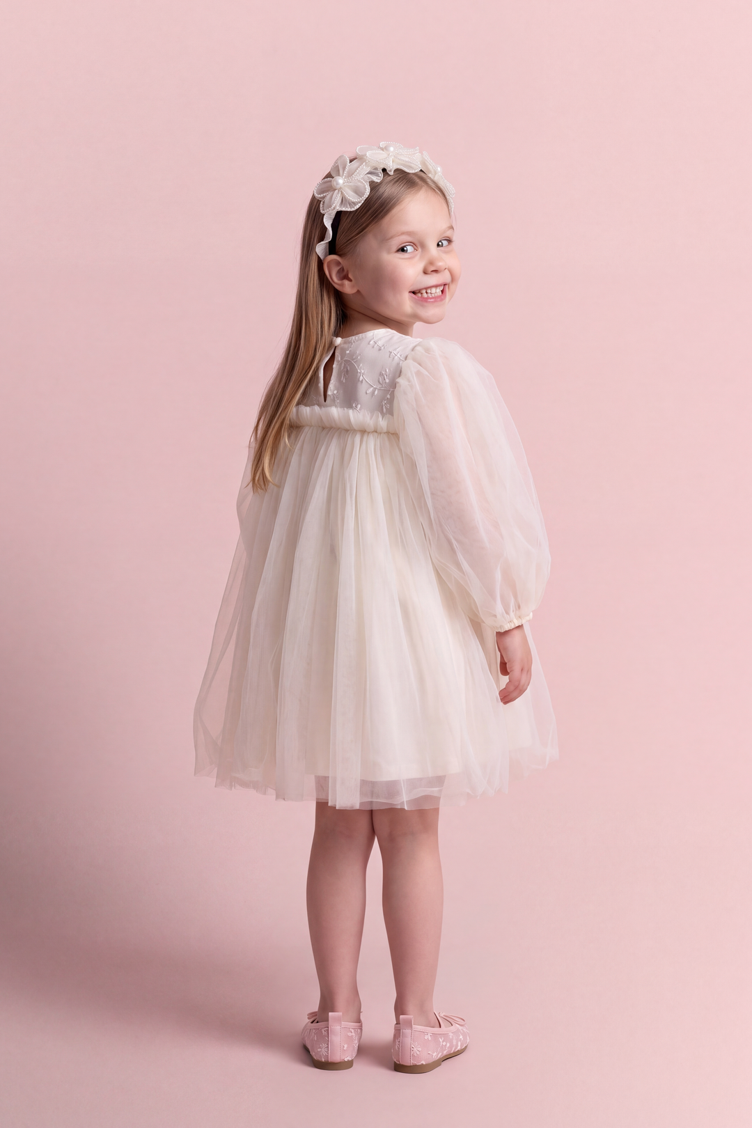 Snowdrop ivory puff sleeve party dress, back view showing the embroidered yoke and the keyhole button at the neck