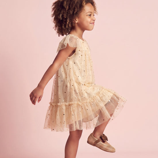 Starlight Dress in cream, side profile