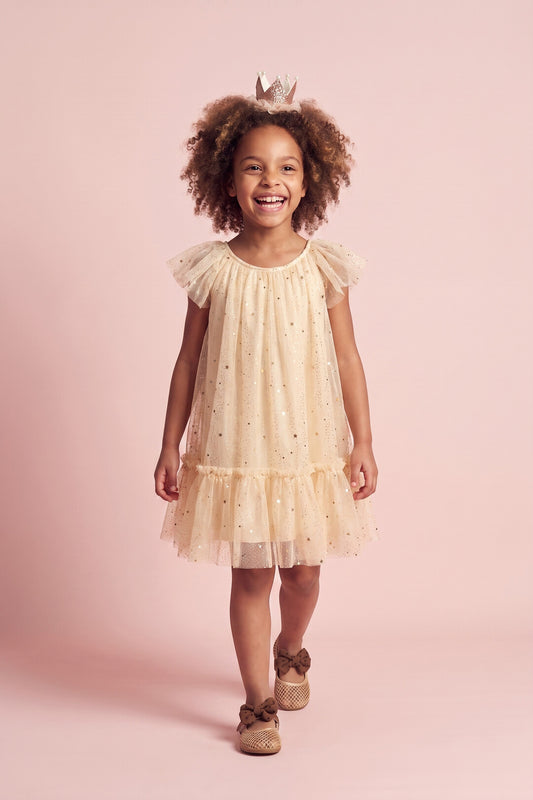 Starlight Dress in cream, three quarter twirl