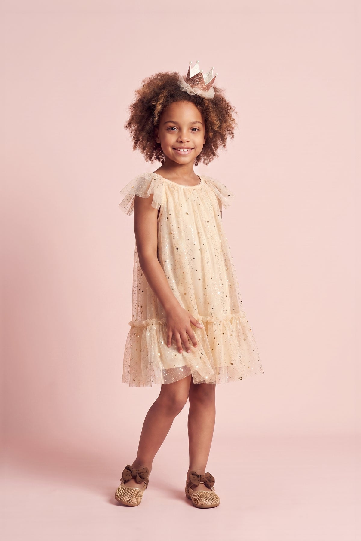 Girl wearing the Starlight Ivory Tulle Flower Girl Dress, front