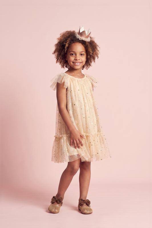 Girl wearing the Starlight Ivory Tulle Flower Girl Dress, front