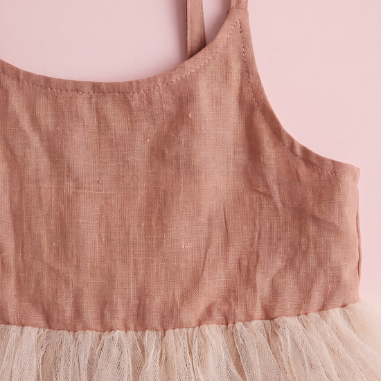 Caramel linen bodice detail with scoop neckline and topstitching