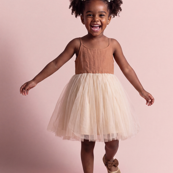 Toffee Caramel Linen Tutu Dress, front view on a toddler model