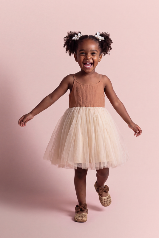Toffee Caramel Linen Tutu Dress, front view on a toddler model