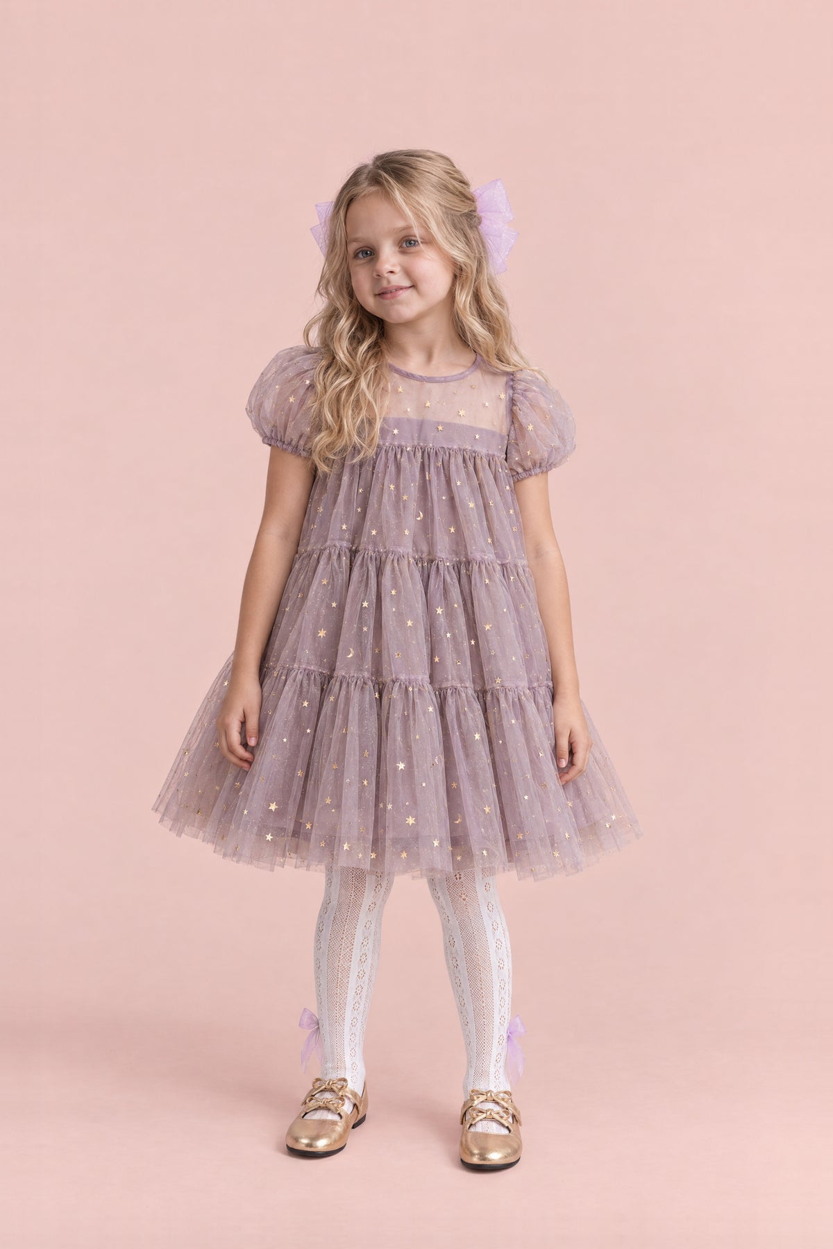 Girl wearing the Wisteria Bloom Lilac Star Tulle Dress, front