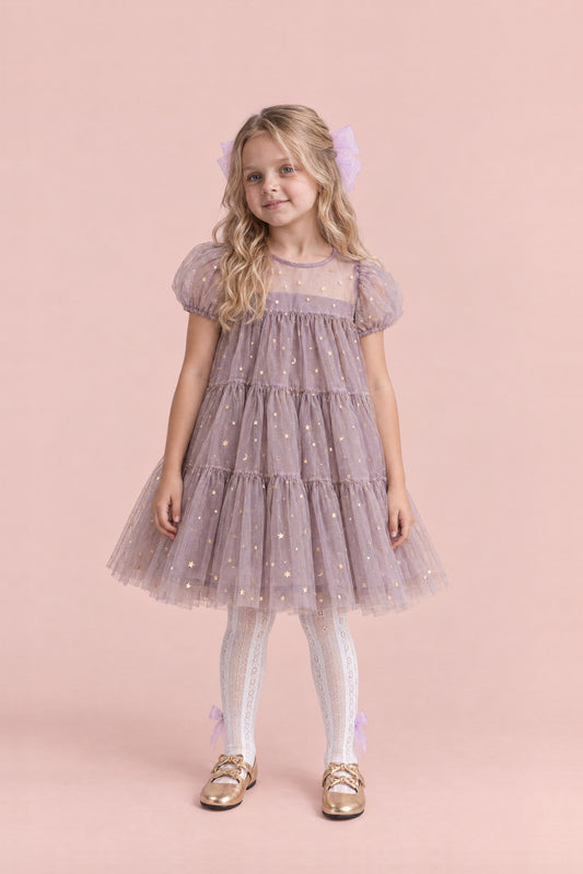 Girl wearing the Wisteria Bloom Lilac Star Tulle Dress, front