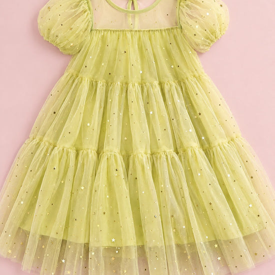 Wisteria Bloom Lime Star Tulle Dress sheer yoke, puff sleeves and gold star tulle, flat lay