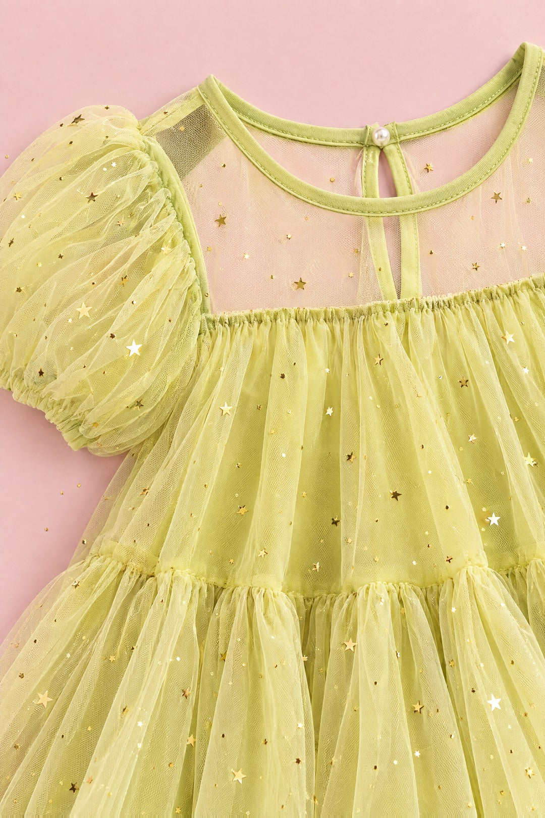 Wisteria Bloom Lime Star Tulle Dress sheer yoke, keyhole button, puff sleeve and gold star tulle, close up
